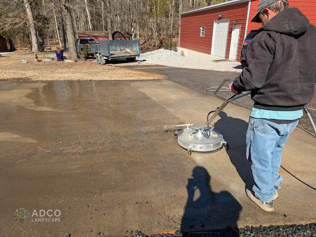 Power washing a driveway.